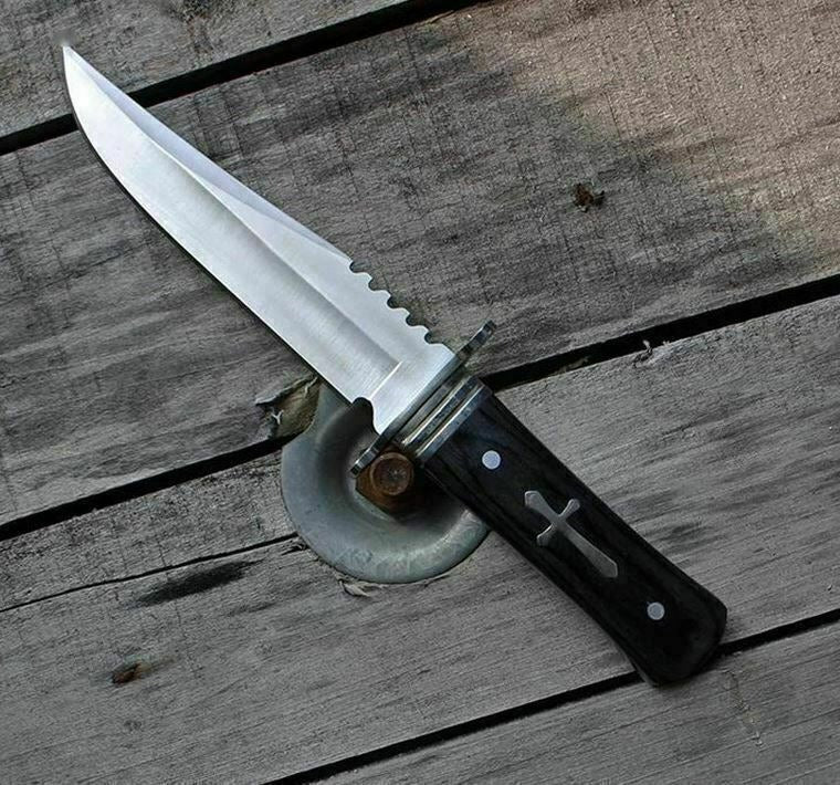 Knife with a classic cross pattern and wood texture handle